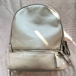 Elegant Cream Backpack with Gold Zippers
